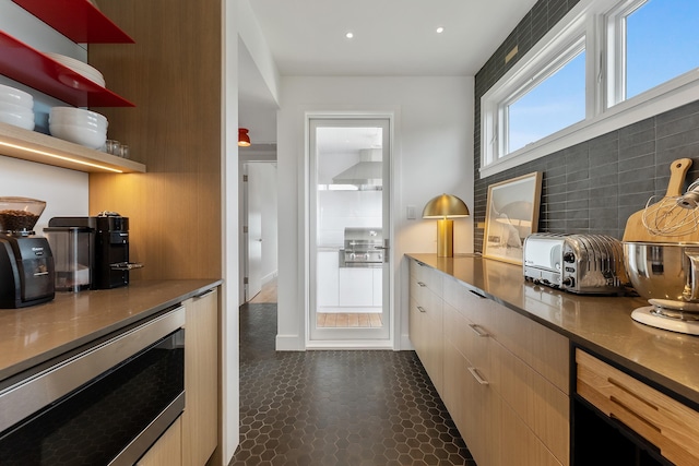 kitchen featuring stainless steel microwave