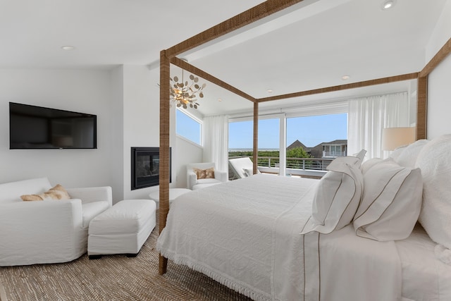 bedroom with vaulted ceiling with beams