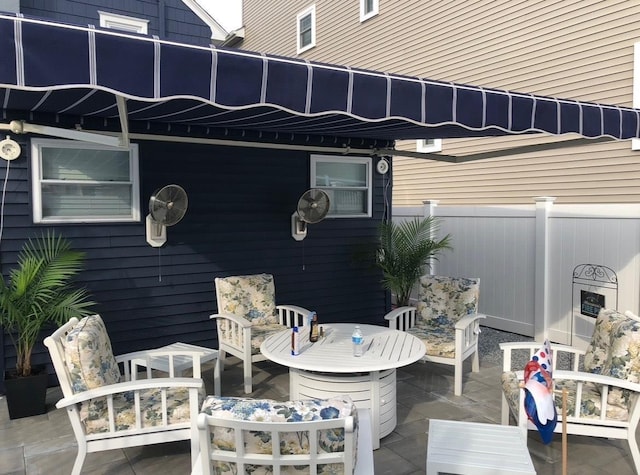 view of patio / terrace with fence