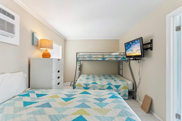 300 Ocean Ave Unit 201, North Wildwood, NJ 08260 - tiled bedroom featuring a wall mounted air conditioner and crown molding