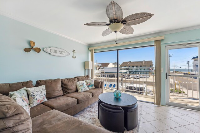 300 Ocean Ave Unit 201, North Wildwood, NJ 08260 - living room featuring a ceiling fan, ornamental molding, and light tile patterned flooring