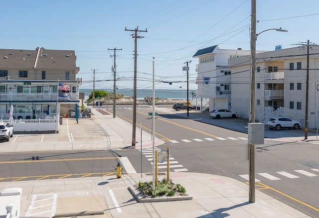 300 Ocean Ave Unit 201, North Wildwood, NJ 08260 - view of asphalt road with sidewalks, street lights, and curbs