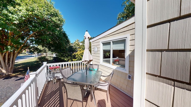 wooden balcony with a deck