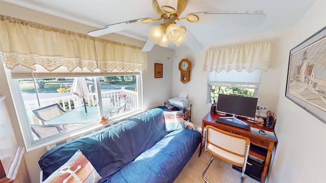 home office with carpet and ceiling fan