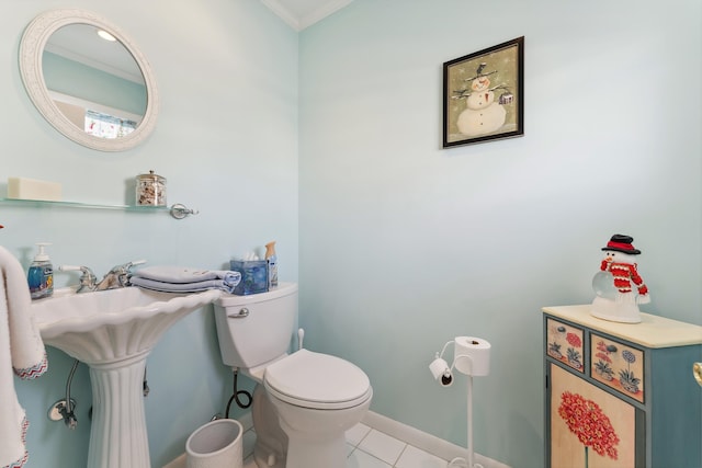 bathroom with tile patterned floors and toilet