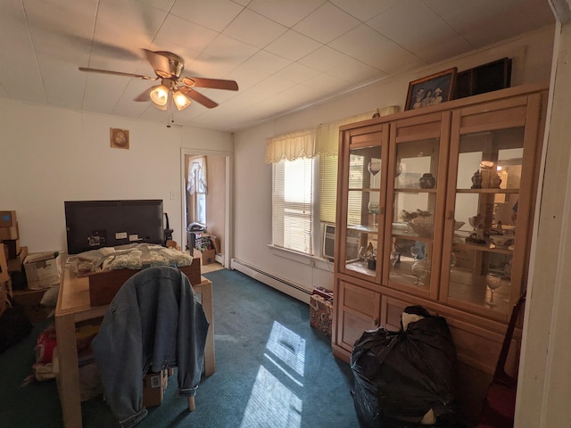 carpeted bedroom with a baseboard radiator, ceiling fan, and cooling unit