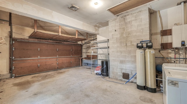 8 Sheila Ave, Seaville, NJ 08230 - garage featuring concrete block wall and tankless water heater
