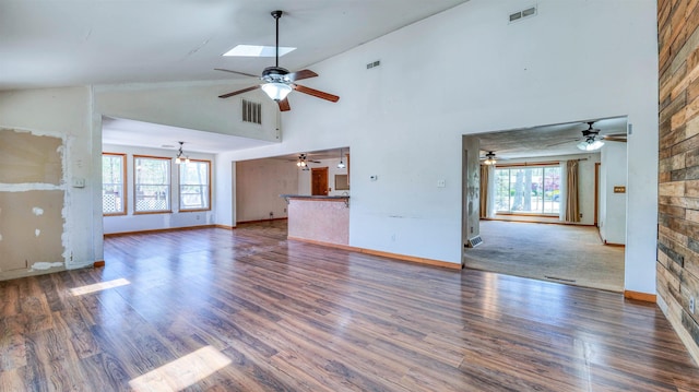 8 Sheila Ave, Seaville, NJ 08230 - unfurnished living room with a ceiling fan, high vaulted ceiling, plenty of natural light, baseboards, and wood finished floors