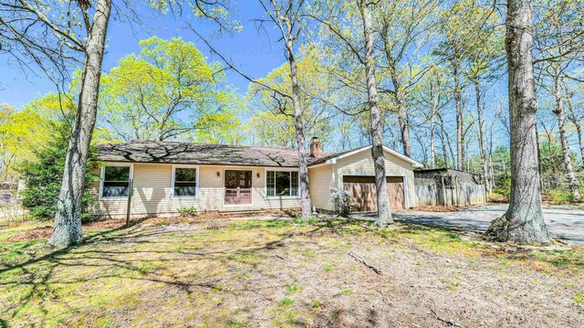 8 Sheila Ave, Seaville, NJ 08230 - ranch-style house with an attached garage and a chimney
