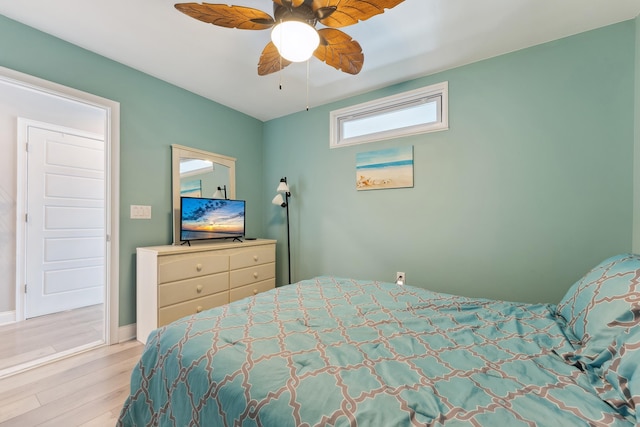 bedroom featuring ceiling fan and light wood-type flooring