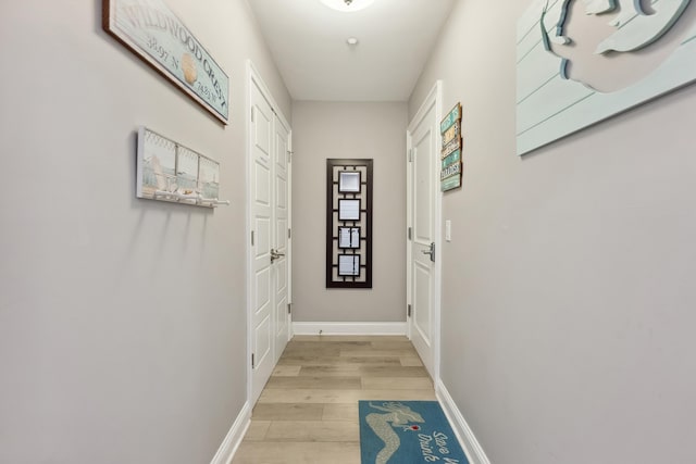 hall featuring light hardwood / wood-style floors