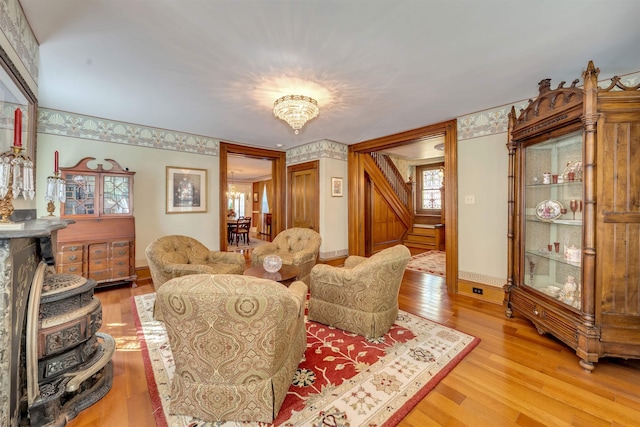 645 Hughes St, Cape May, NJ 08204 - living area with light wood finished floors and stairs