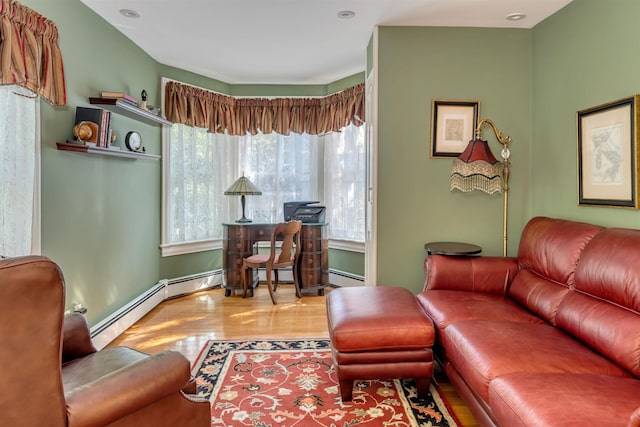 645 Hughes St, Cape May, NJ 08204 - living area featuring wood finished floors and baseboard heating
