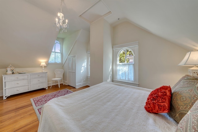 645 Hughes St, Cape May, NJ 08204 - bedroom with lofted ceiling, wood finished floors, and attic access