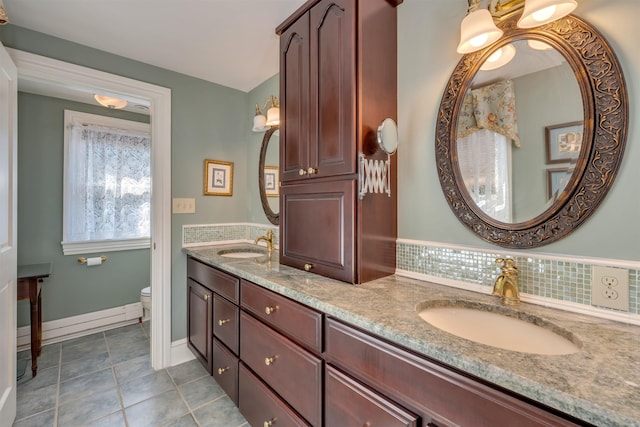 645 Hughes St, Cape May, NJ 08204 - full bathroom featuring double vanity and tile patterned flooring