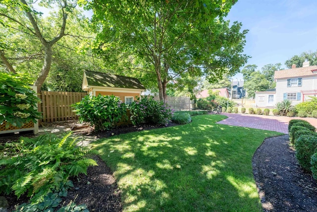 645 Hughes St, Cape May, NJ 08204 - fenced backyard featuring a storage unit