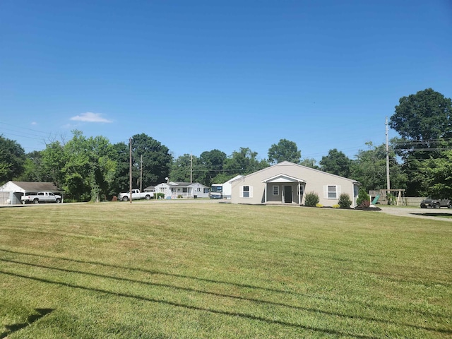 exterior space with a front lawn