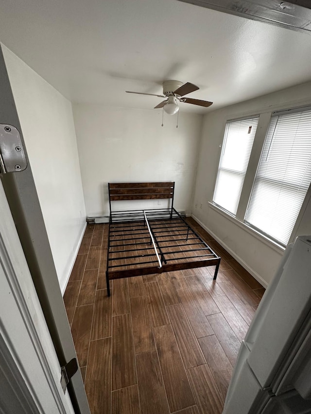 unfurnished bedroom featuring ceiling fan