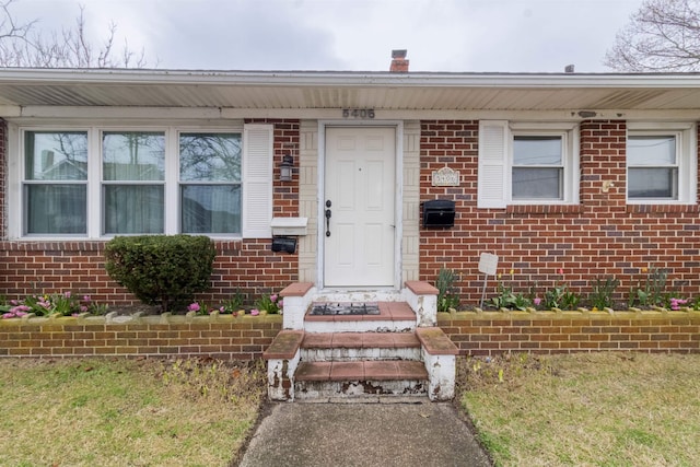 view of front of house with brick siding