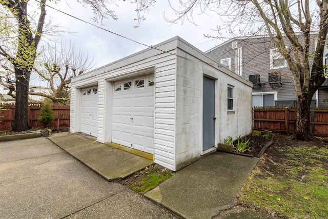 detached garage with fence