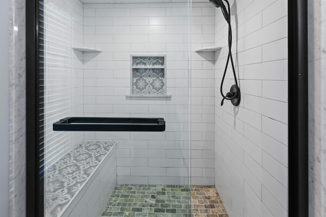 bathroom with a stall shower