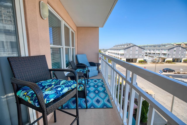 balcony featuring a residential view