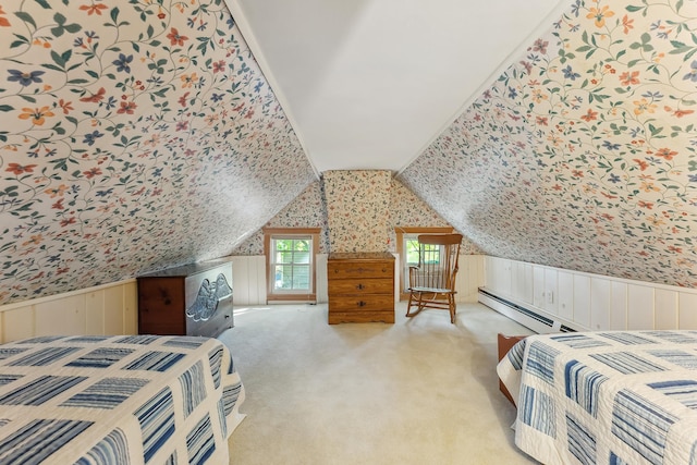 bedroom with carpet floors, wainscoting, wallpapered walls, a baseboard heating unit, and vaulted ceiling