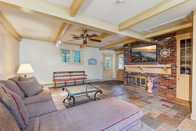 living room featuring beam ceiling, a brick fireplace, baseboards, a baseboard radiator, and stone tile flooring