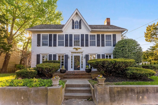 colonial home with a chimney