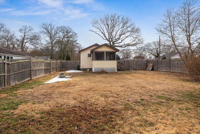 view of yard with a sunroom