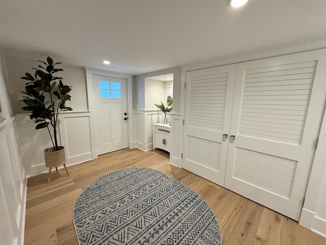 foyer entrance featuring light hardwood / wood-style flooring