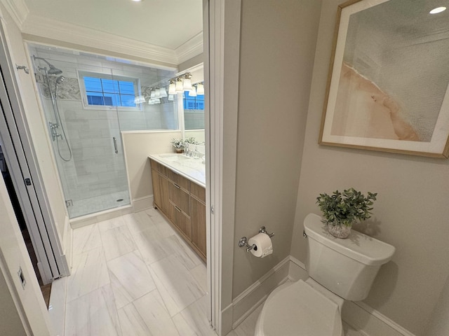 bathroom featuring a shower with door, vanity, ornamental molding, and toilet