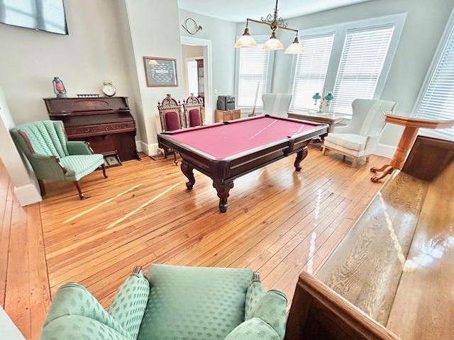 rec room featuring hardwood / wood-style flooring and billiards