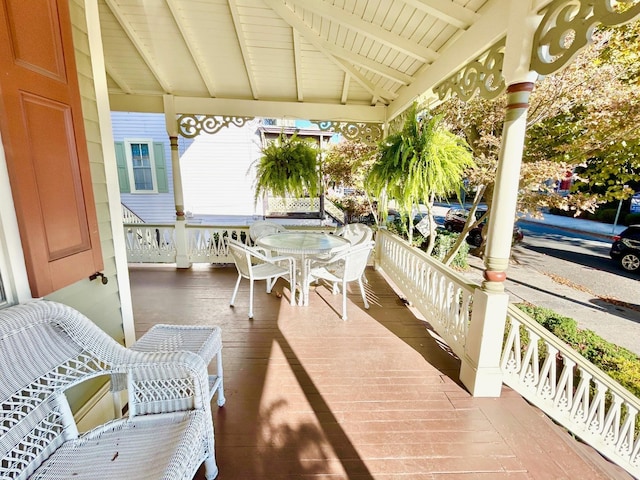 wooden deck featuring covered porch