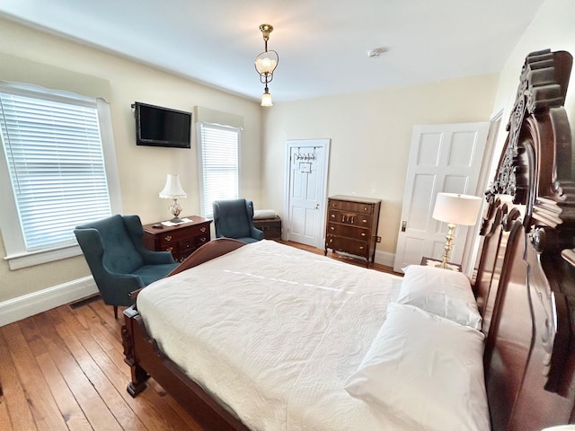 bedroom featuring hardwood / wood-style flooring