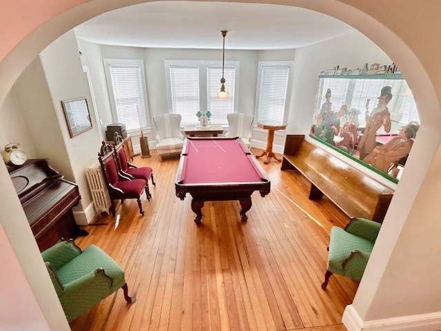 playroom featuring radiator, light hardwood / wood-style flooring, and billiards