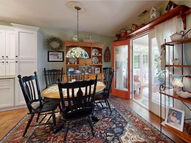 63 Cape Woods Rd, North Cape May, NJ 08204 - dining space with light wood-style floors