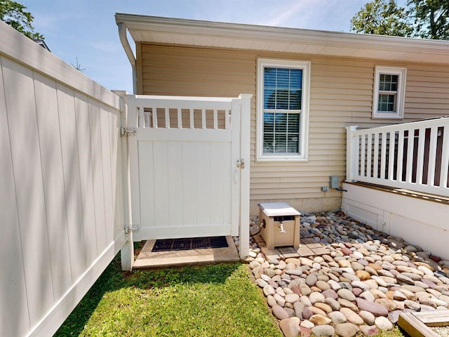 63 Cape Woods Rd, North Cape May, NJ 08204 - view of side of home with a gate
