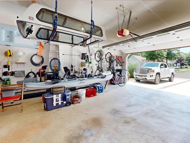 63 Cape Woods Rd, North Cape May, NJ 08204 - garage featuring a garage door opener