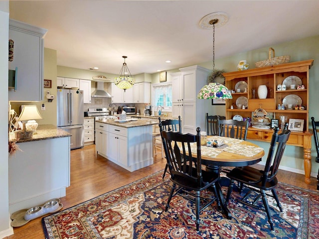 63 Cape Woods Rd, North Cape May, NJ 08204 - dining area featuring light wood-style floors and recessed lighting