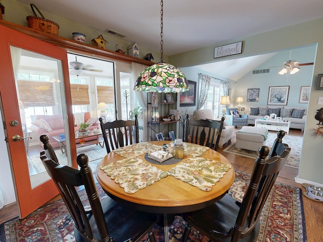 63 Cape Woods Rd, North Cape May, NJ 08204 - dining area featuring a ceiling fan, wood finished floors, and vaulted ceiling