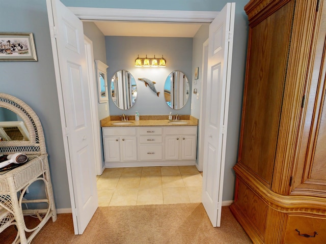 63 Cape Woods Rd, North Cape May, NJ 08204 - bathroom with double vanity and tile patterned flooring