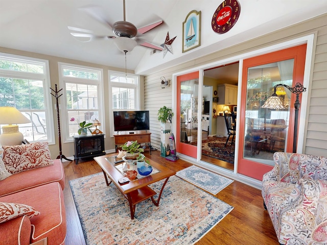 63 Cape Woods Rd, North Cape May, NJ 08204 - living area with ceiling fan, wood finished floors, wooden walls, and vaulted ceiling