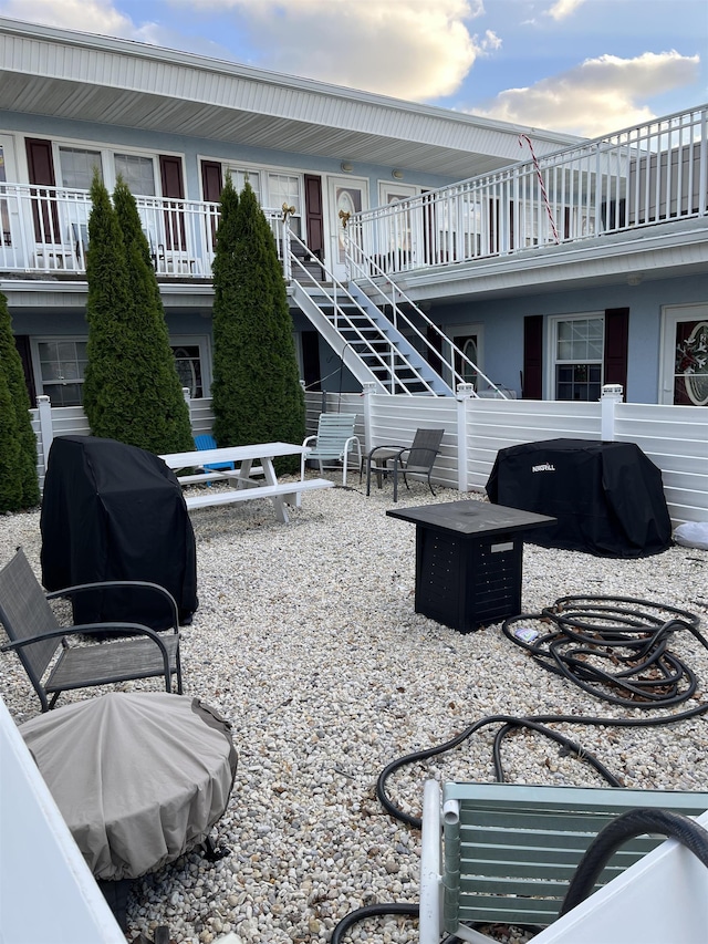 view of patio / terrace with area for grilling and a fire pit