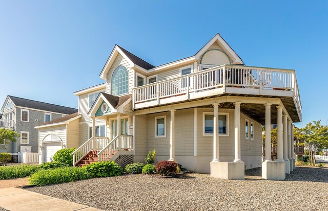 7423 Ocean Dr, Avalon, NJ 08202 - view of front of property with an attached garage and a wooden deck