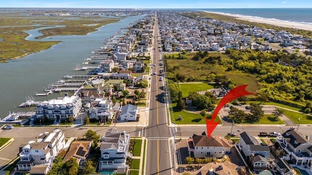 7423 Ocean Dr, Avalon, NJ 08202 - aerial perspective of suburban area featuring a large body of water