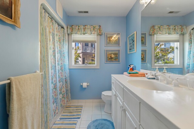 7423 Ocean Dr, Avalon, NJ 08202 - full bath with toilet, tile patterned floors, vanity, and curtained shower