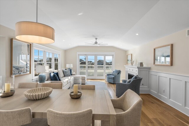 10700 3rd Ave S, Unit South, Stone Harbor, NJ 08247 - living area featuring visible vents, wainscoting, lofted ceiling, wood finished floors, and a fireplace