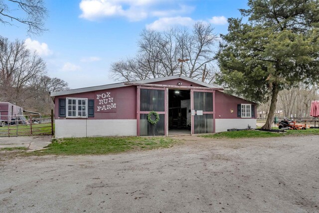 716 Dias Creek Rd, Cape May Court House, NJ 08210 - view of front of property featuring concrete block siding and fence