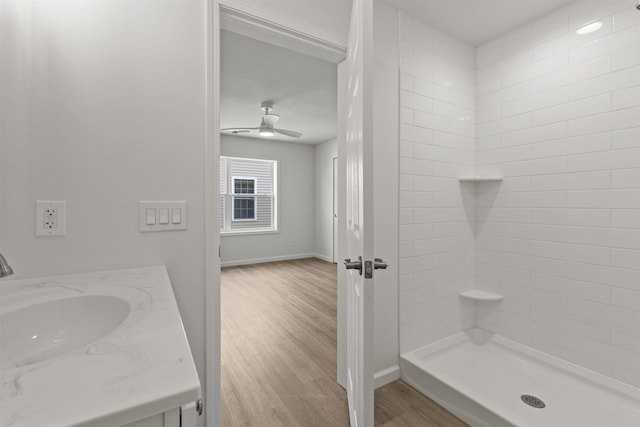 108 Sunray Beach Rd, Del Haven, NJ 08251 - bathroom with wood finished floors, vanity, tiled shower, and ceiling fan